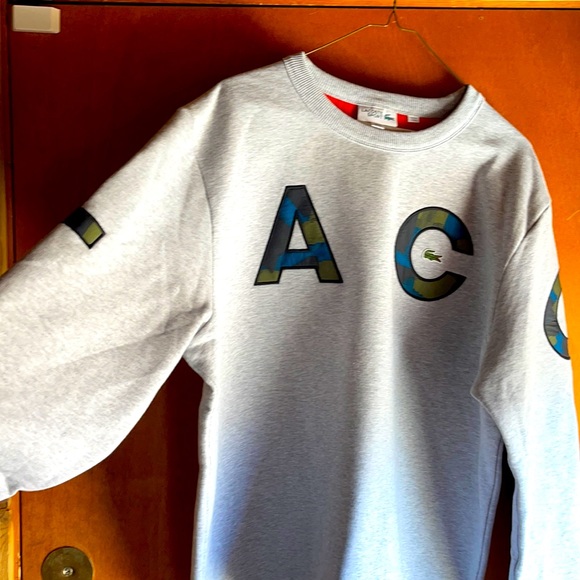 LaCoste sweater with camo lettering